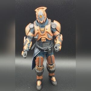 Action Figure with Copper and Black Armor